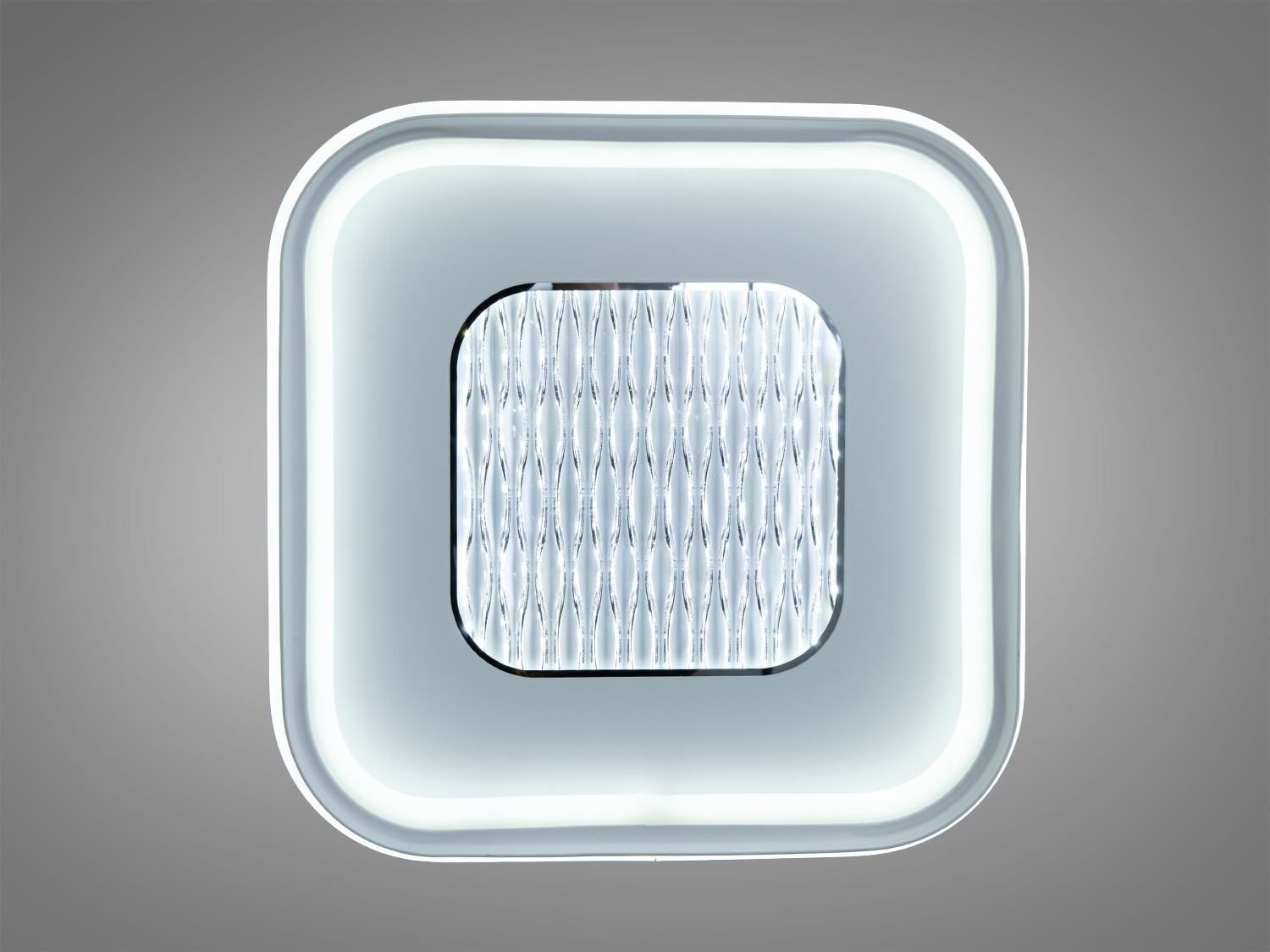 Світильник квадратної форми з матовим покриттям, оснащений LED-технологією, ідеальний для офісних приміщень.