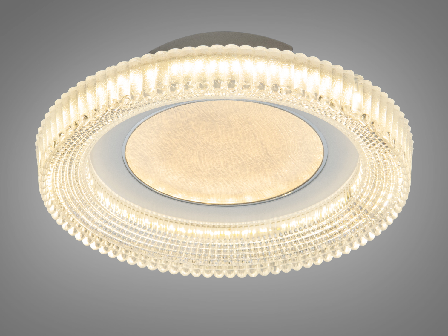 Стельова лампа з текстурованим скляним корпусом, що випромінює тепле світло. Ідеальна для затишних кімнат.