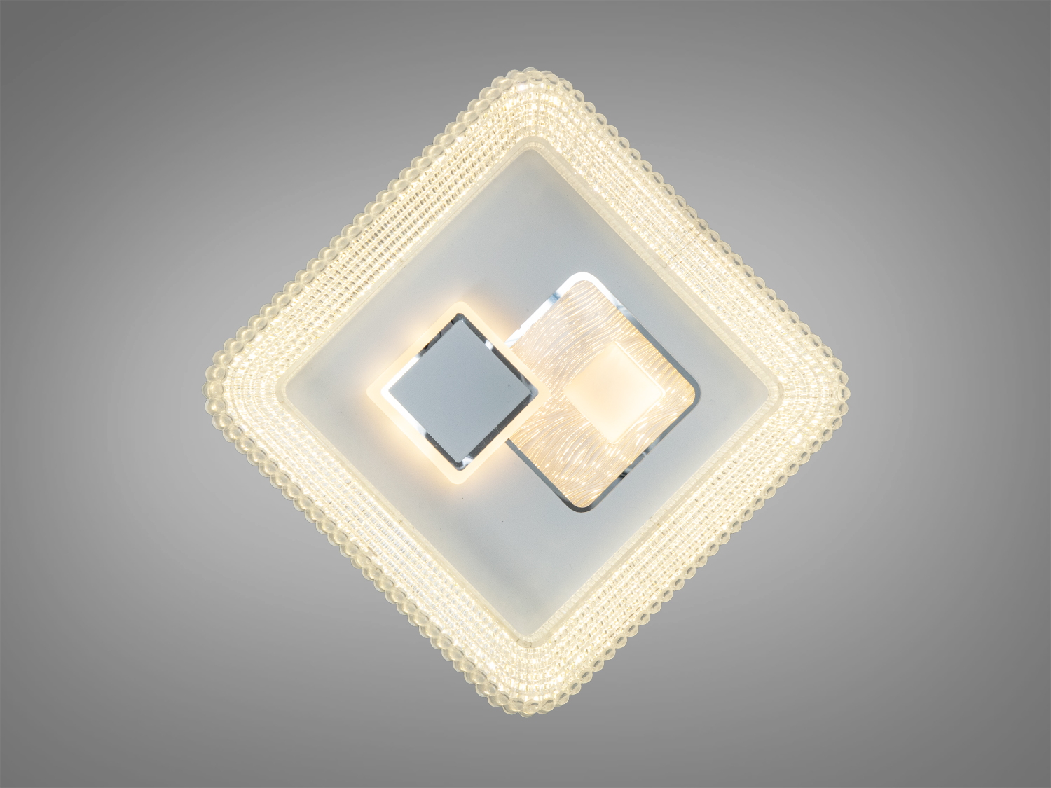 Настінний світильник з двома кільцями, виготовлений з акрилу, підходить для житлових кімнат, забезпечує холодне освітлення.