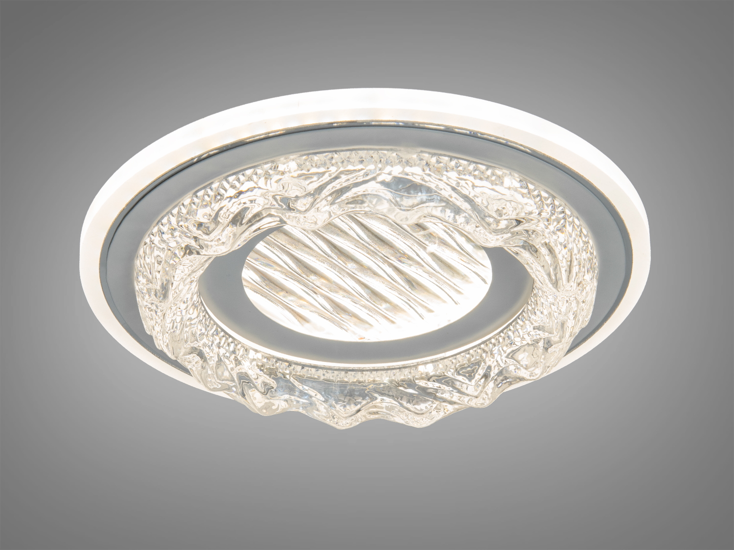 Декоративний світильник з хвилястим скляним абажуром, що випромінює м′яке світло. Ідеальний для створення затишної атмосфери в житлових кімнатах.