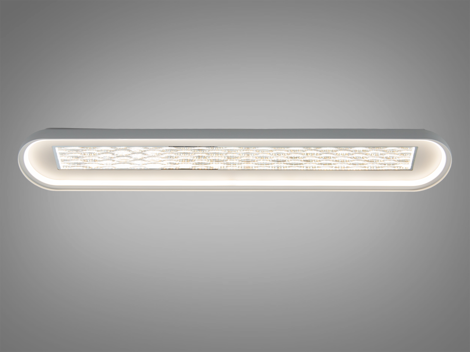 Лінійний світильник з овальною рамкою, що забезпечує рівномірне освітлення. Підходить для сучасних інтер′єрів.