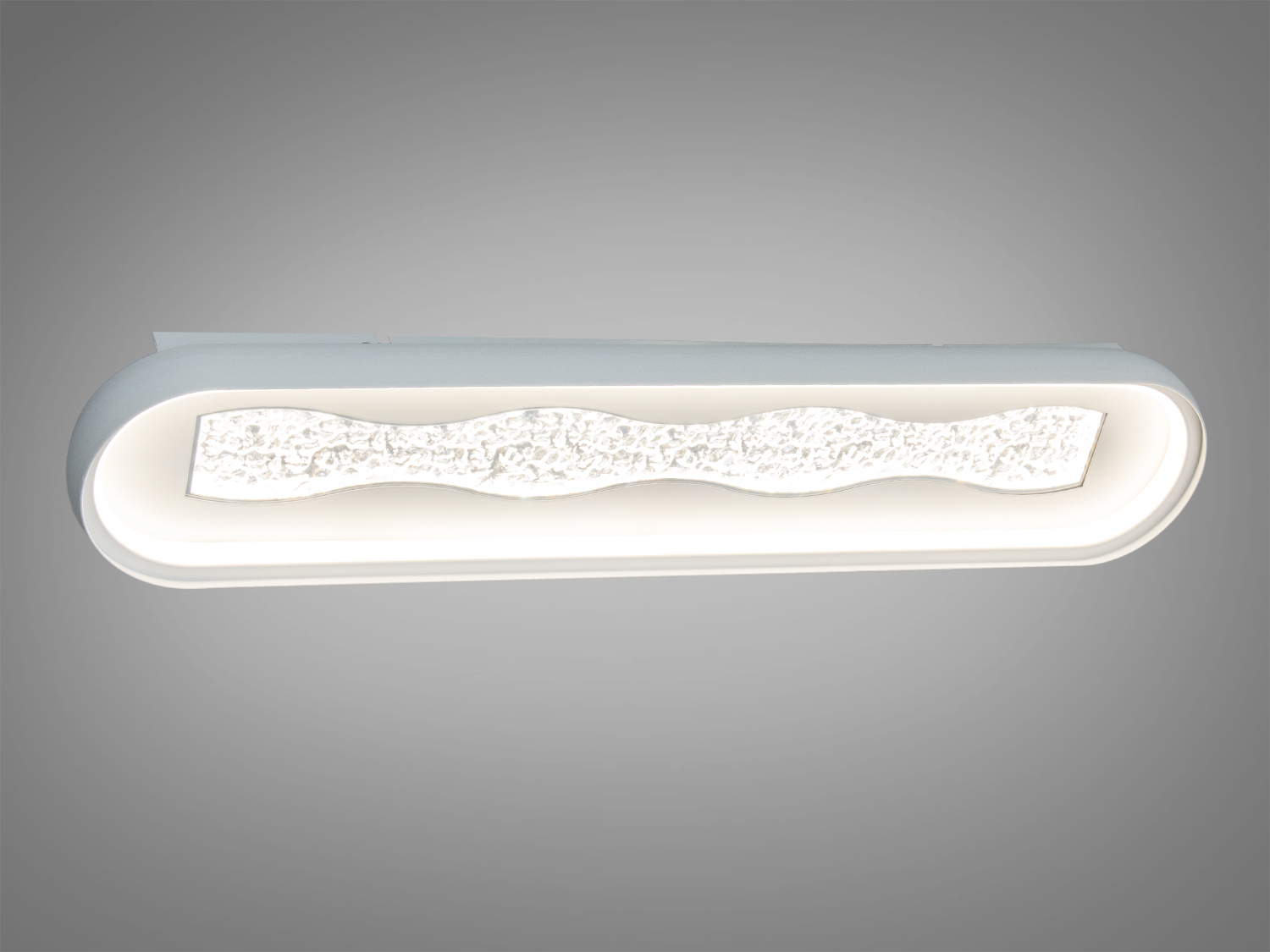 Світильник овальної форми з хвилястим візерунком, підходить для настінного монтажу. Виготовлений з матового матеріалу, випромінює тепле світло.