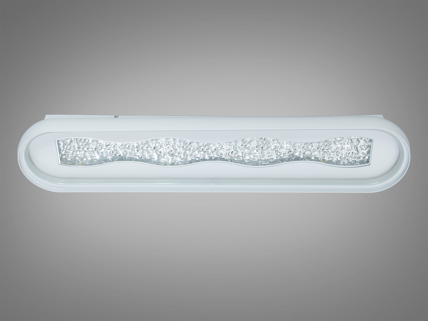 Настінний світильник з текстурованою поверхнею, має хвилястий центральний елемент. Підходить для ванних кімнат, забезпечує рівномірне світло.