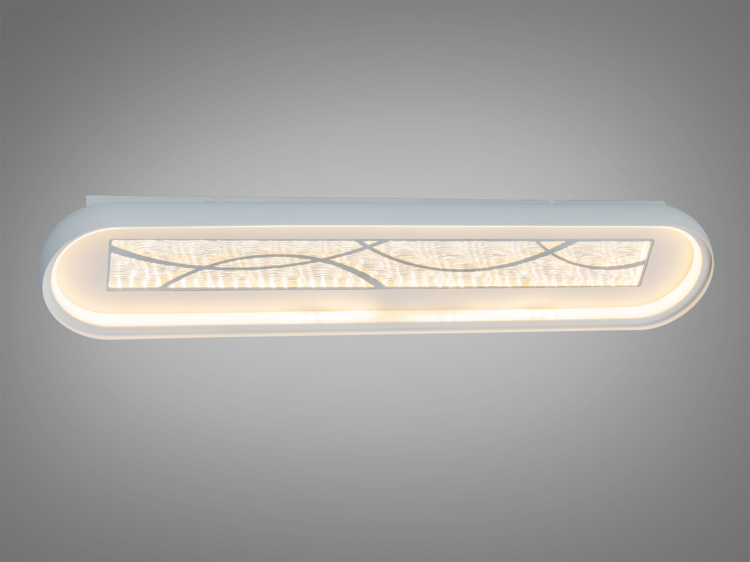 Овальний світильник з білим корпусом і теплим світлом. Декоративний візерунок підходить для сучасних інтер′єрів.