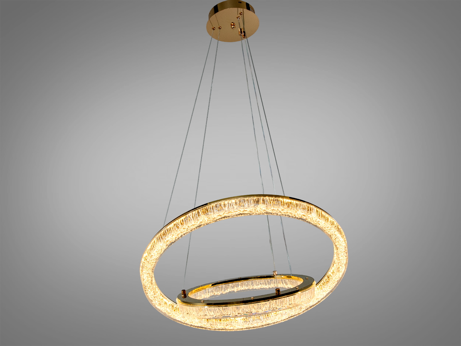 Підвісна LED люстра 70Вт у золоті з двома акриловими кільцями. ~4950 лм, три режими 3200/4100/6000K, регулювання висоти, настінне керування. Для кімнат до ~13 м².