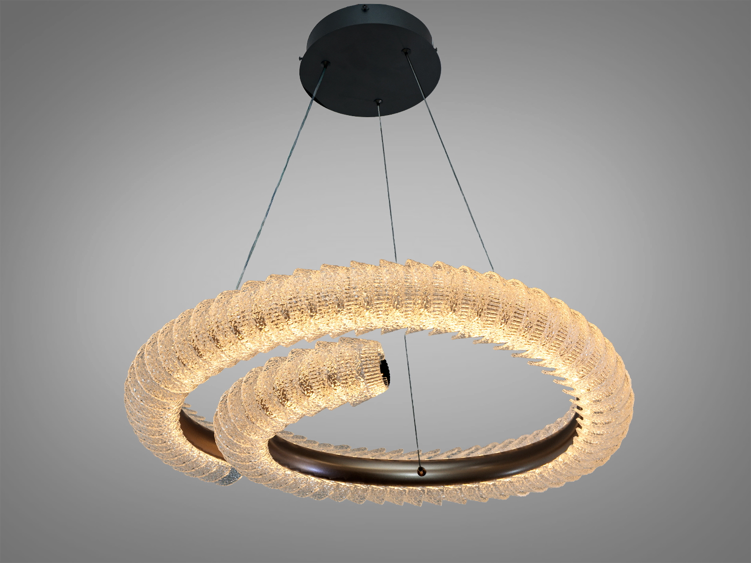 Підвісний світильник у формі кільця з прозорого акрилу, підходить для монтажу на стелі в житлових приміщеннях.