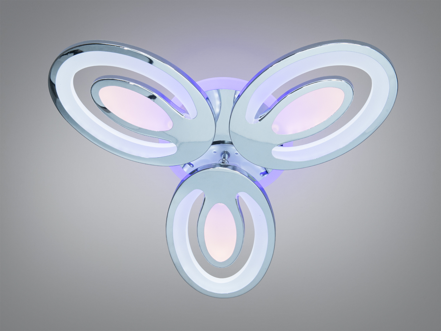 Стельовий світильник з трьома кільцями, що випромінюють холодне світло. Використовується для сучасних інтер′єрів.