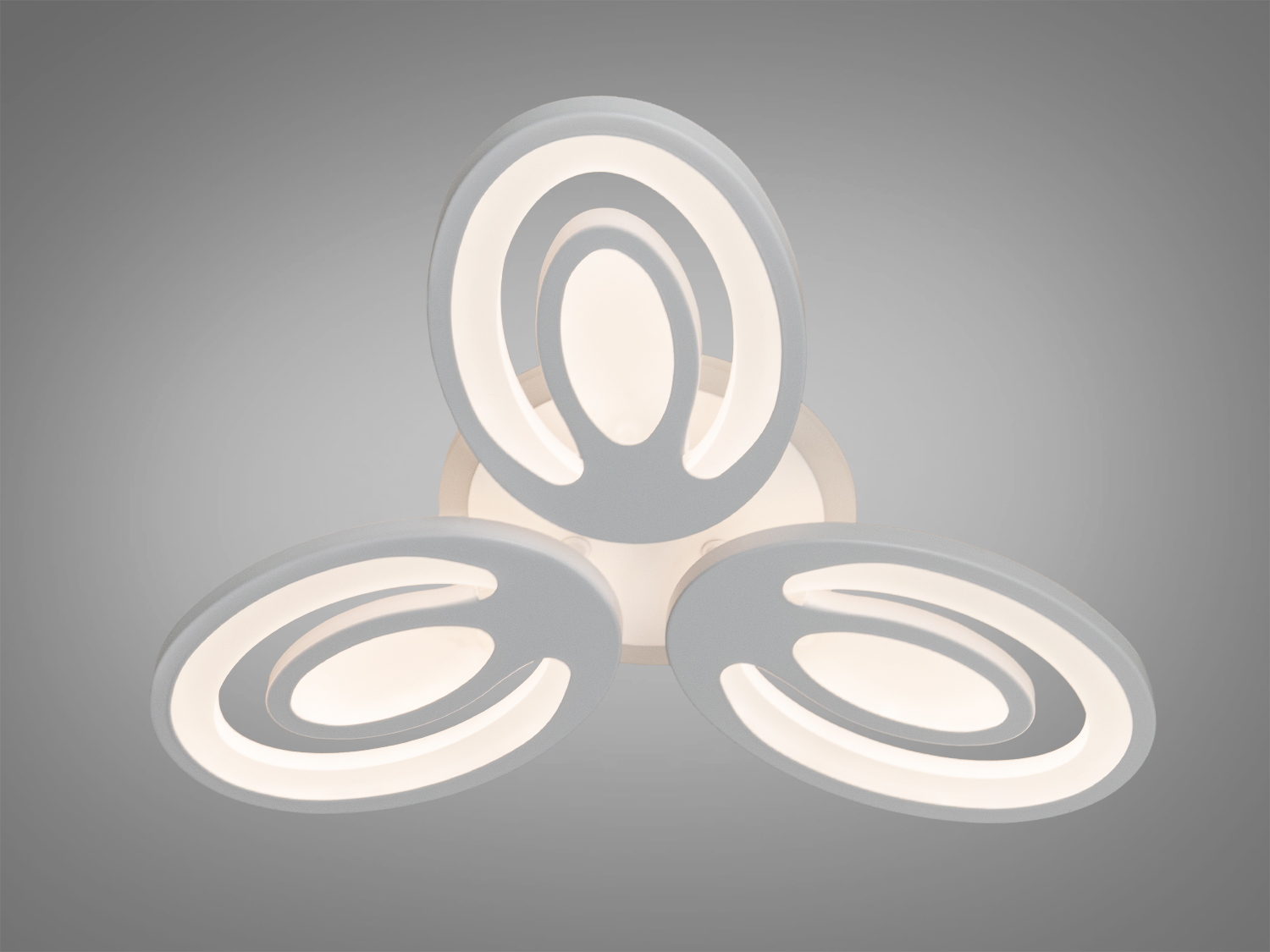 Стельовий світильник із трьома овальними панелями, що забезпечують рівномірне освітлення. Підходить для офісів.