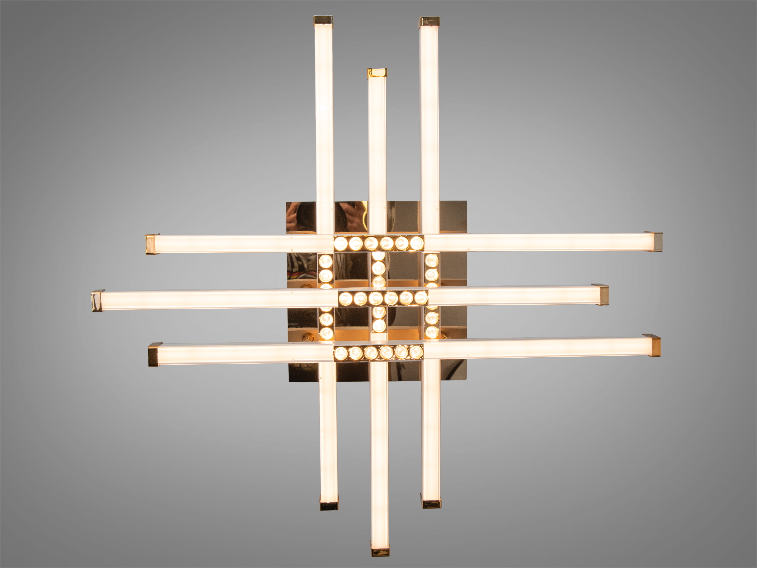 Декоративний світильник з геометричним дизайном, тепле світло, ідеально для вітальні.