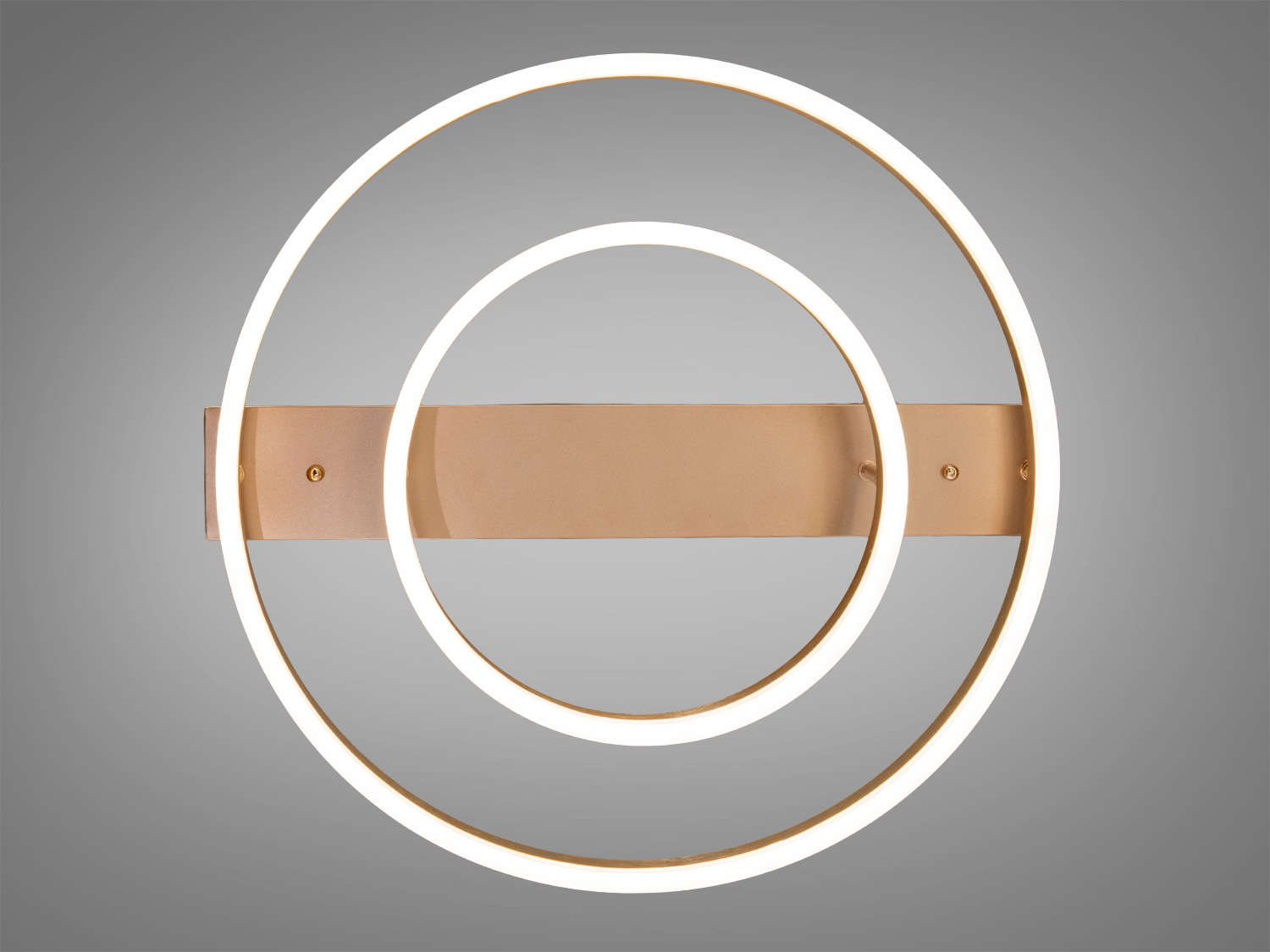 Світильник з двома LED кільцями, встановлений на прямокутній основі, золотистий колір, підходить для мінімалістичних інтер′єрів.