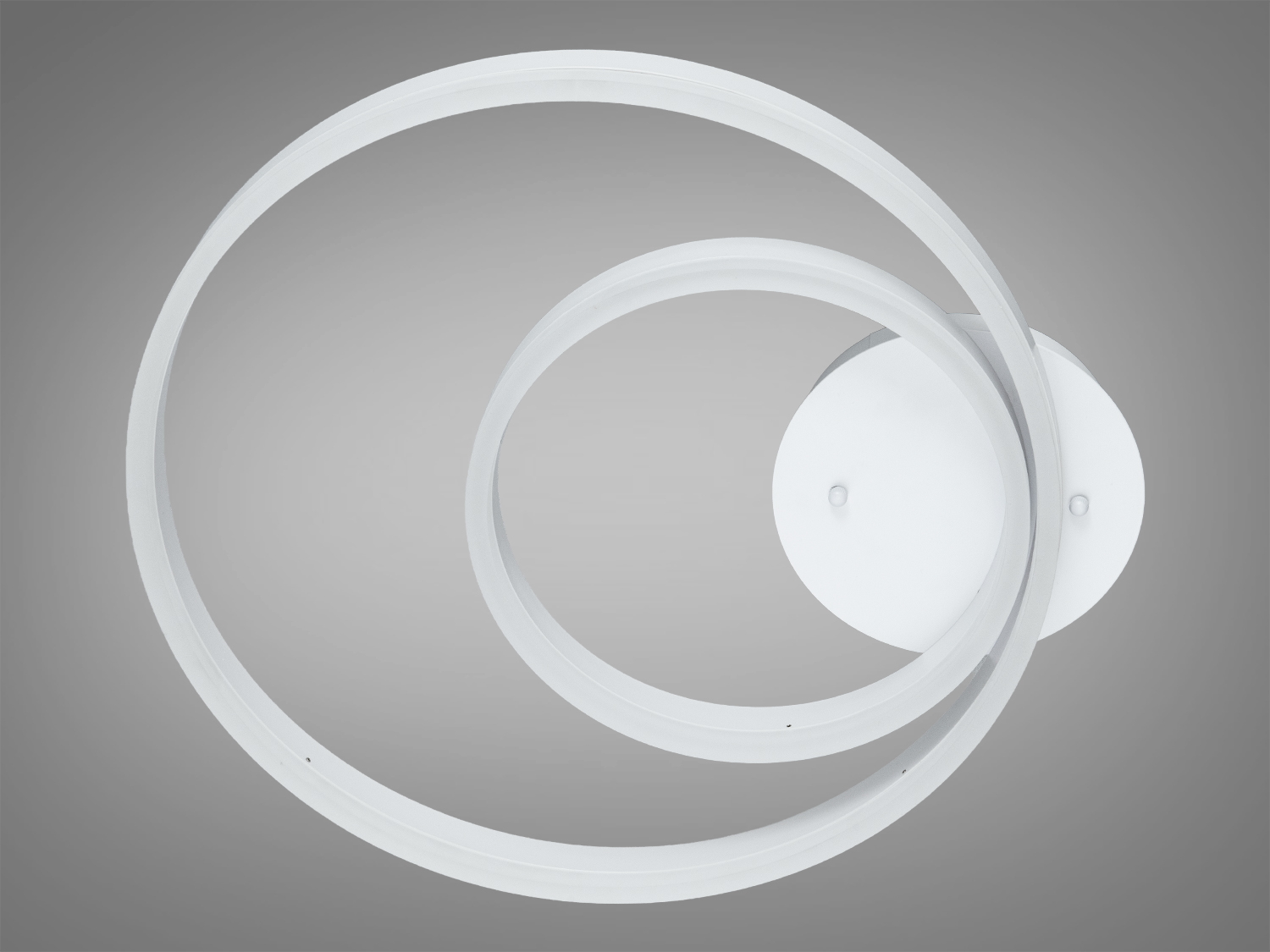 Світильник з двома кільцями, виготовлений з металу, підходить для монтажу на стелі в офісних приміщеннях.