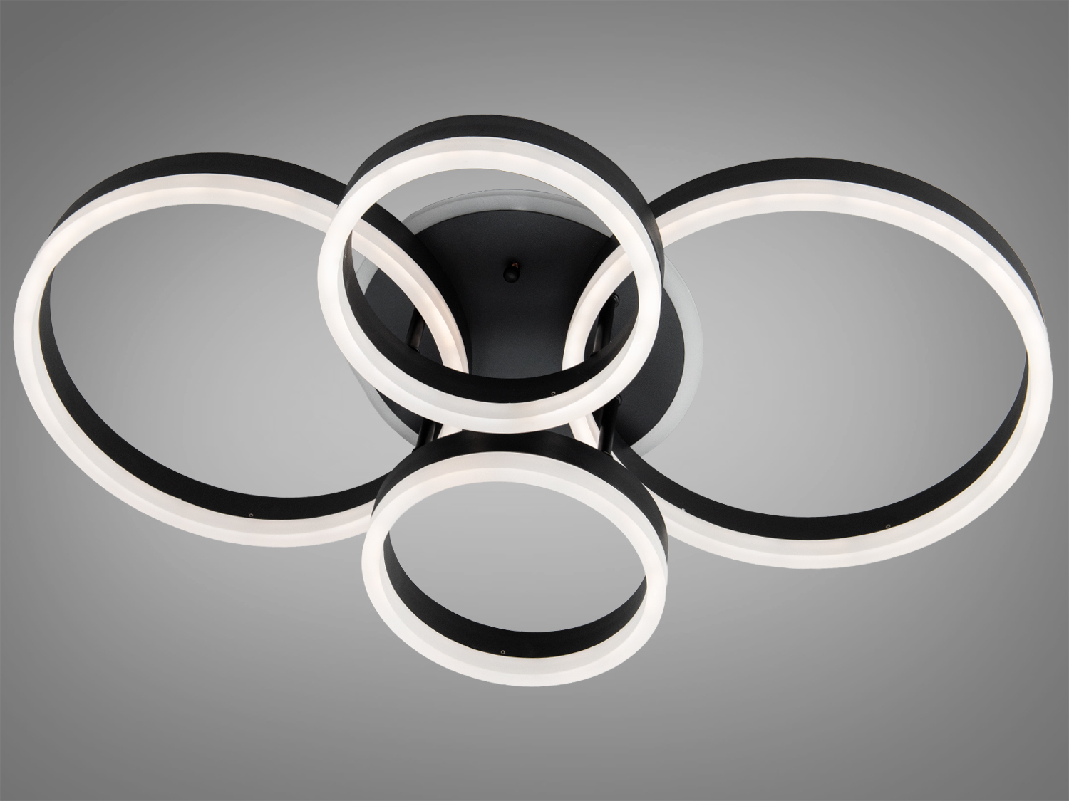 Підвісний світильник з чотирма кільцями, біле світло, чорний металевий корпус, підходить для офісу або спальні.