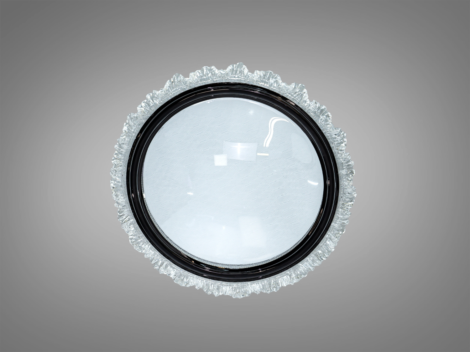 Круглий світильник з прозорою текстурою, що забезпечує яскраве освітлення. Використовується для акцентного освітлення.