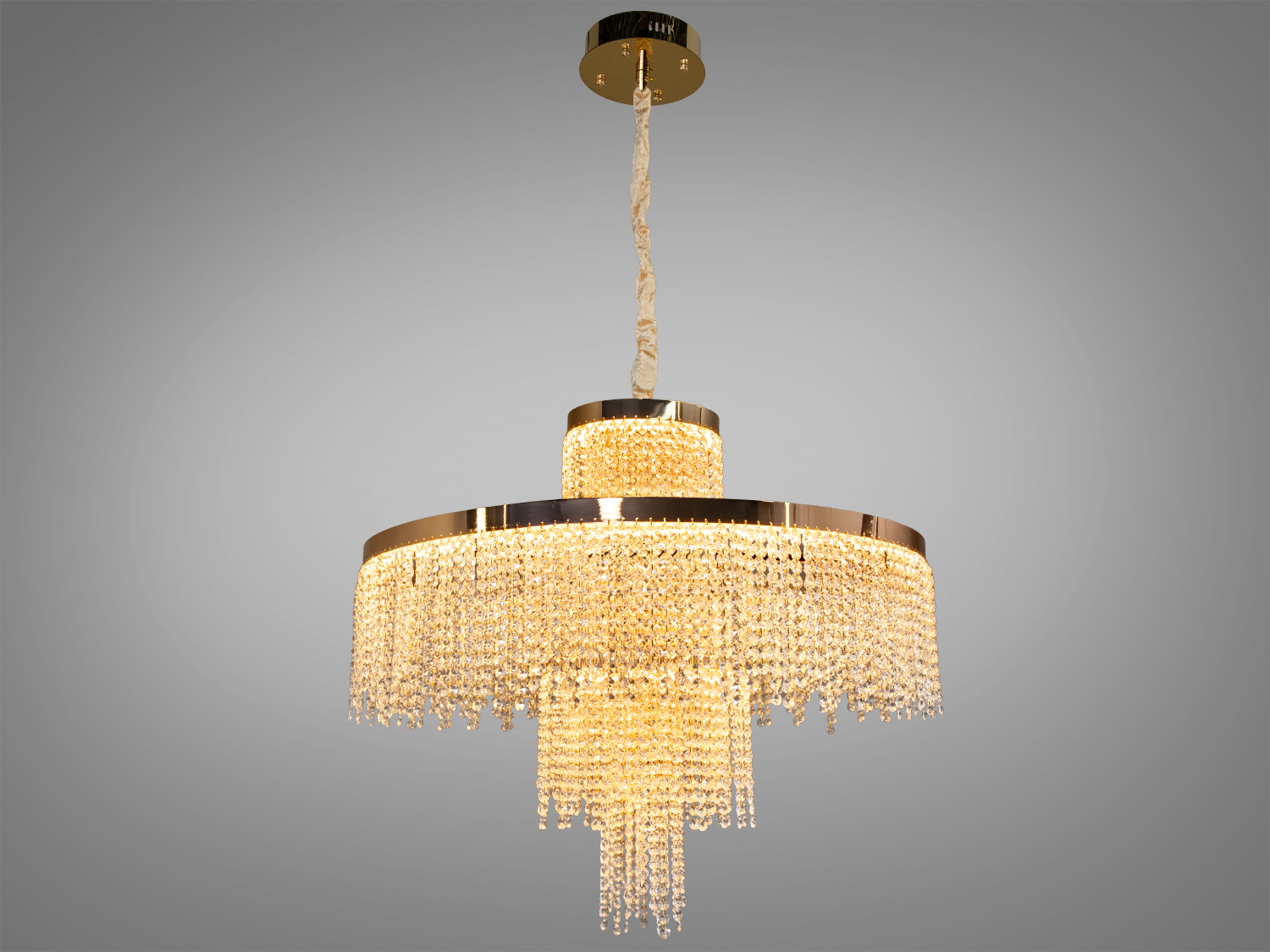 Кругла люстра з кришталевими підвісками, підвісний монтаж, підходить для вітальні. Золотистий каркас додає елегантності.