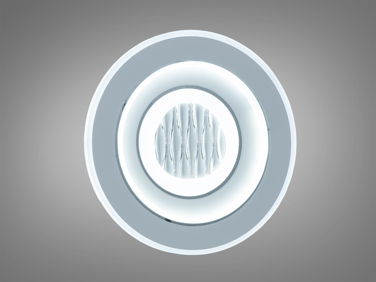 Світильник з холодним світлом, круглої форми, ідеальний для офісних приміщень.