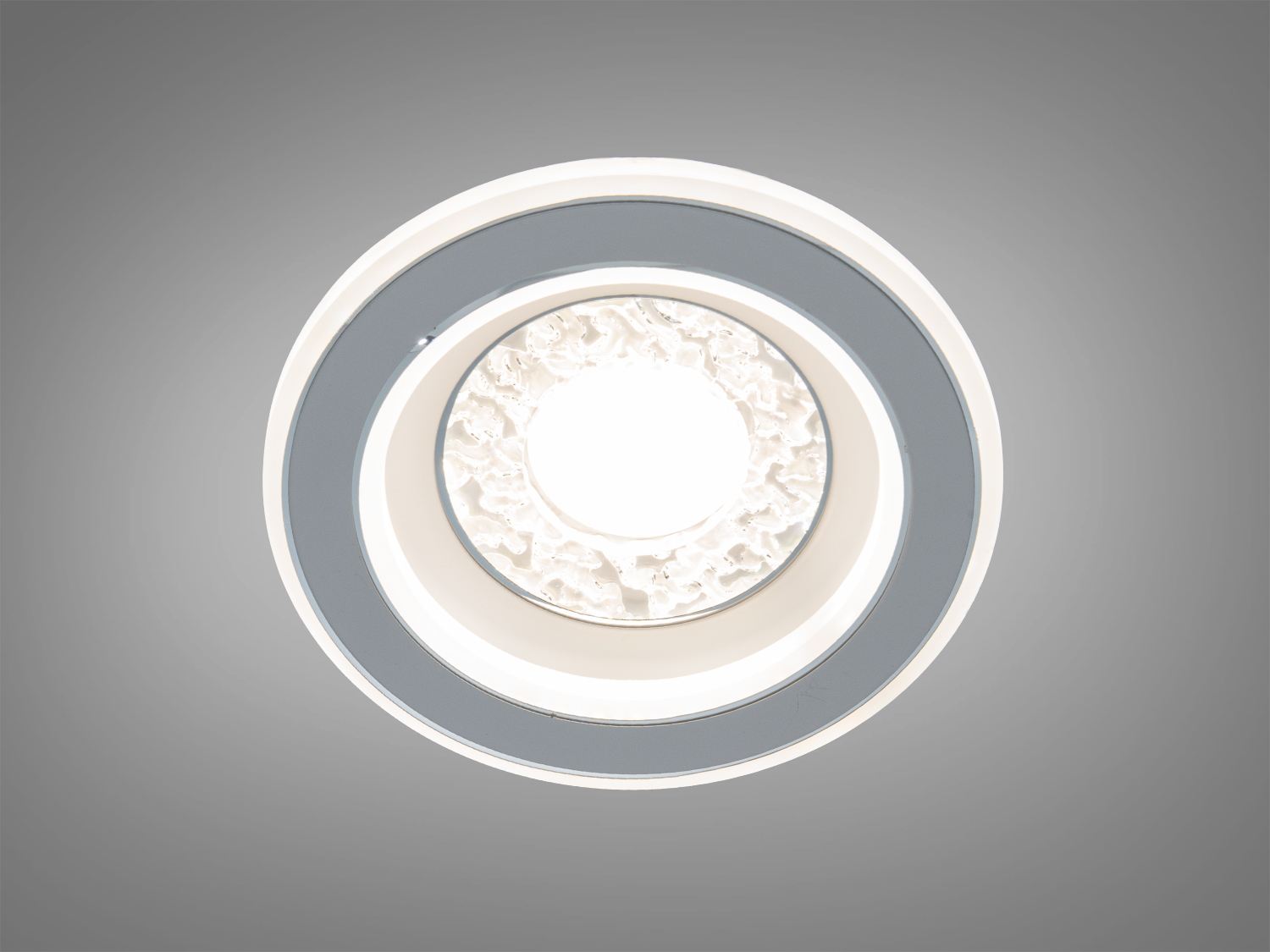 Кругла світлодіодна панель Diasha 38 Вт у сірому кольорі для кімнат до 7 м². М’яке розсіяне світло та просте керування від настінного вимикача.