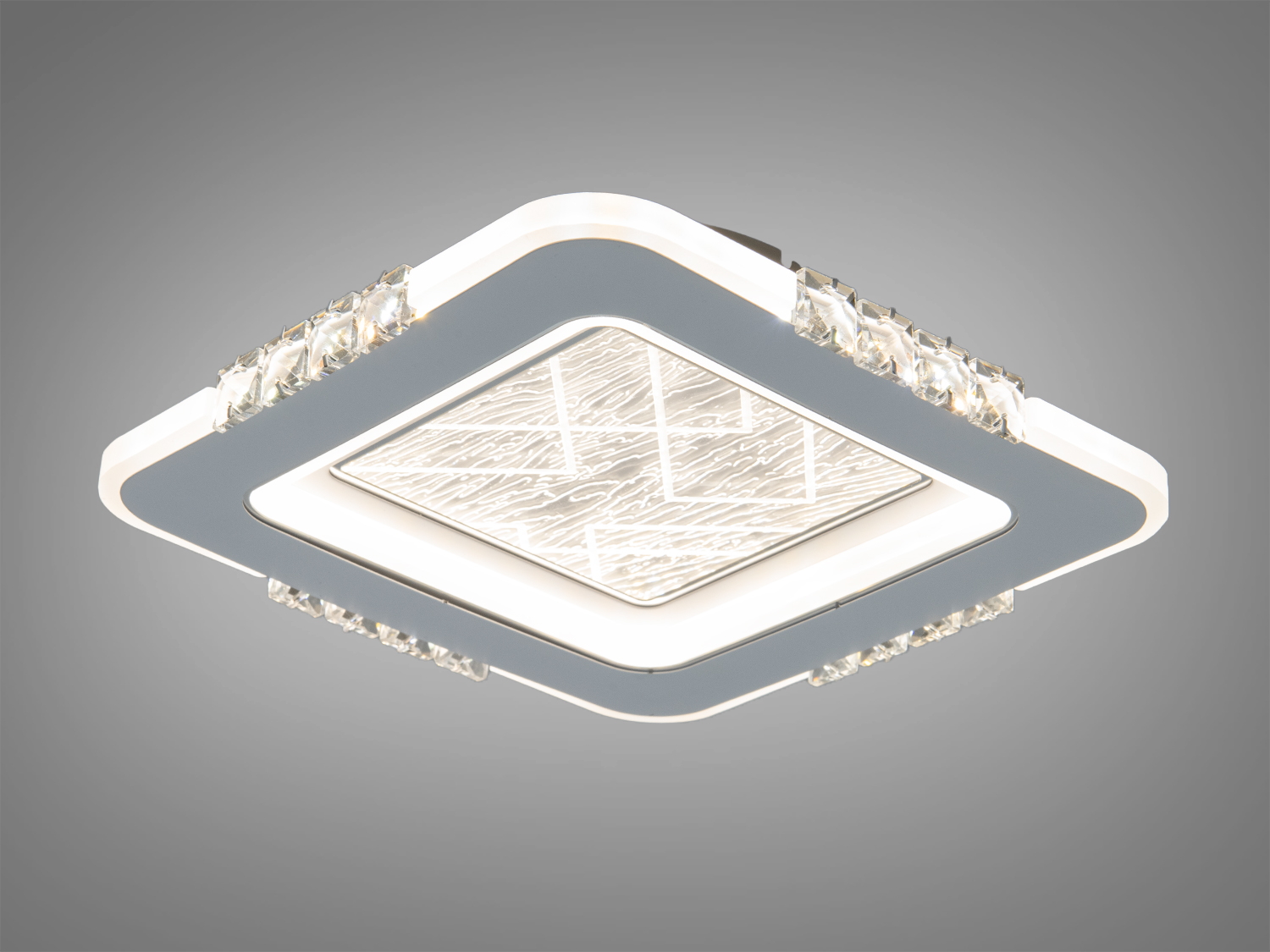 Квадратний LED стельовий світильник 40 Вт у білому кольорі з прозорими вставками. Рекомендований для кімнат до 7 м², керування від настінного вимикача.