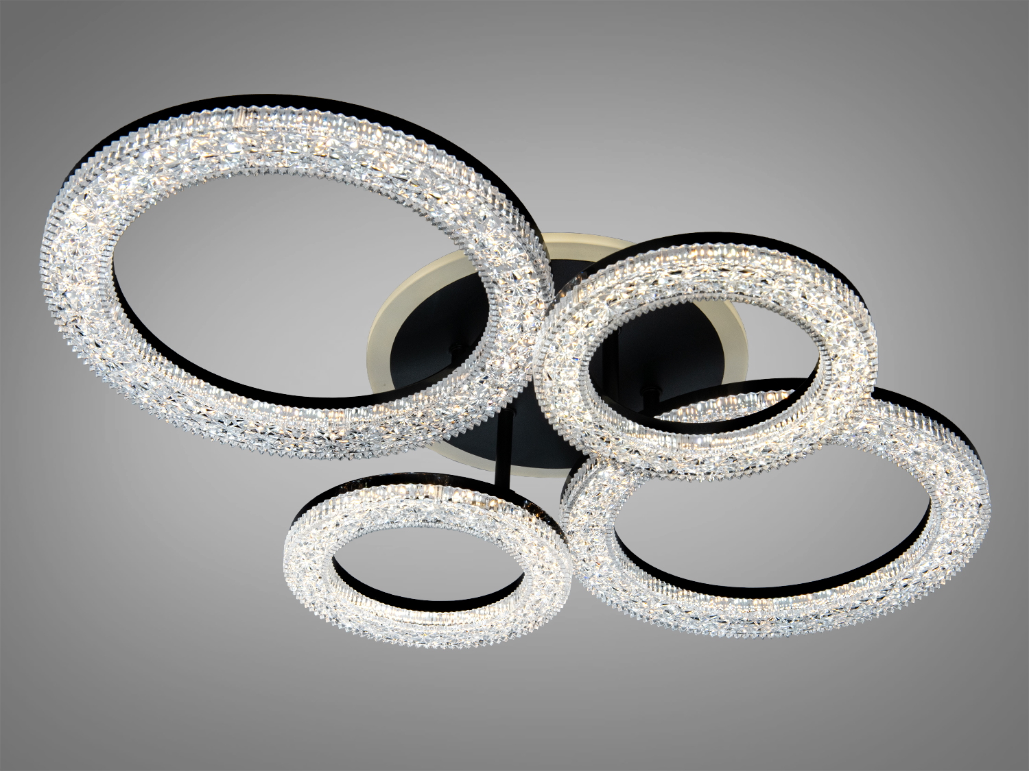 Підвісний світильник з чотирма кристалічними кільцями, що створюють ефектний світловий малюнок. Ідеальний для вітальні.