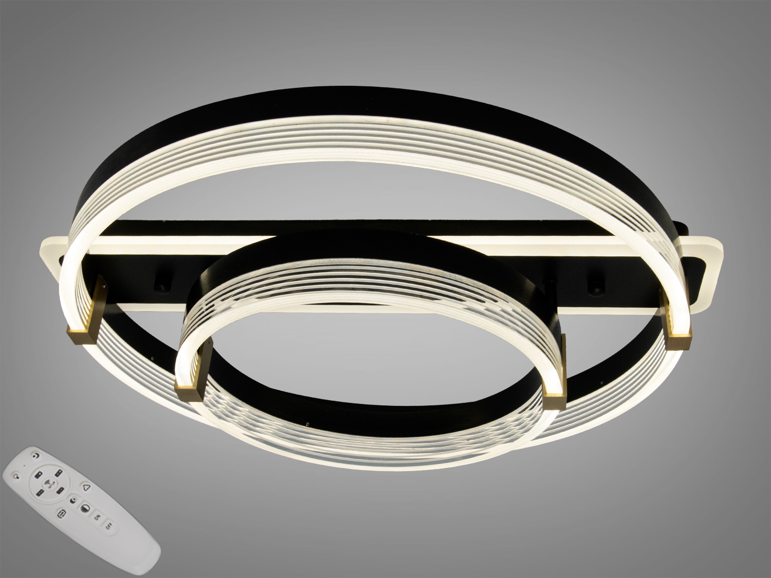 Світильник з двома кільцями, оснащений пультом дистанційного керування, підходить для стельового монтажу в сучасних інтер′єрах.
