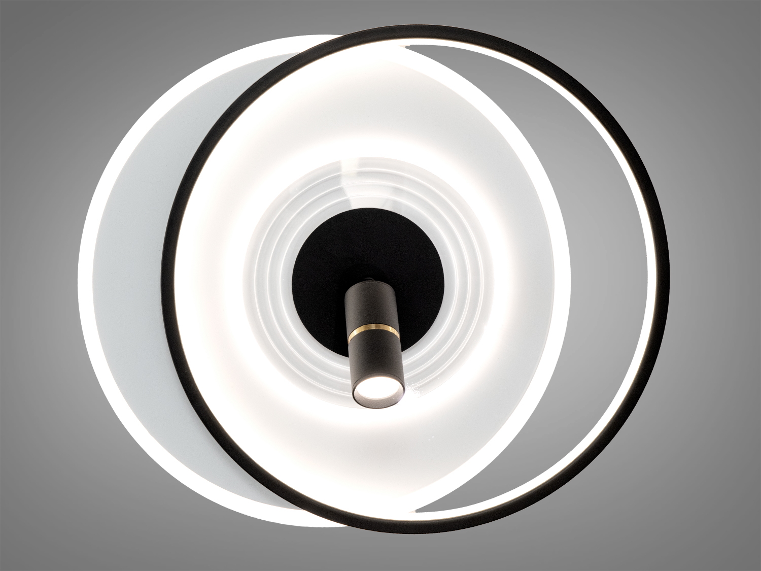 Світильник з концентричними колами, біле світло, чорний корпус, дистанційне керування, ідеальний для мінімалістичного інтер′єру.