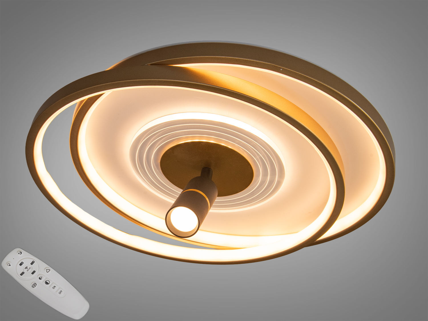 Стельовий світильник з круглими кільцями та центральним світлодіодом, оснащений пультом дистанційного керування для зручного регулювання яскравості.
