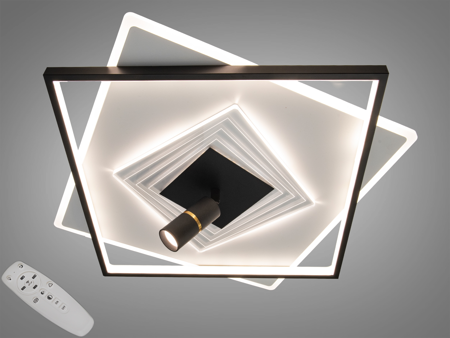 Стельовий світильник з квадратними рамками, що перекриваються, з вбудованим точковим світлом, підходить для сучасних інтер′єрів.