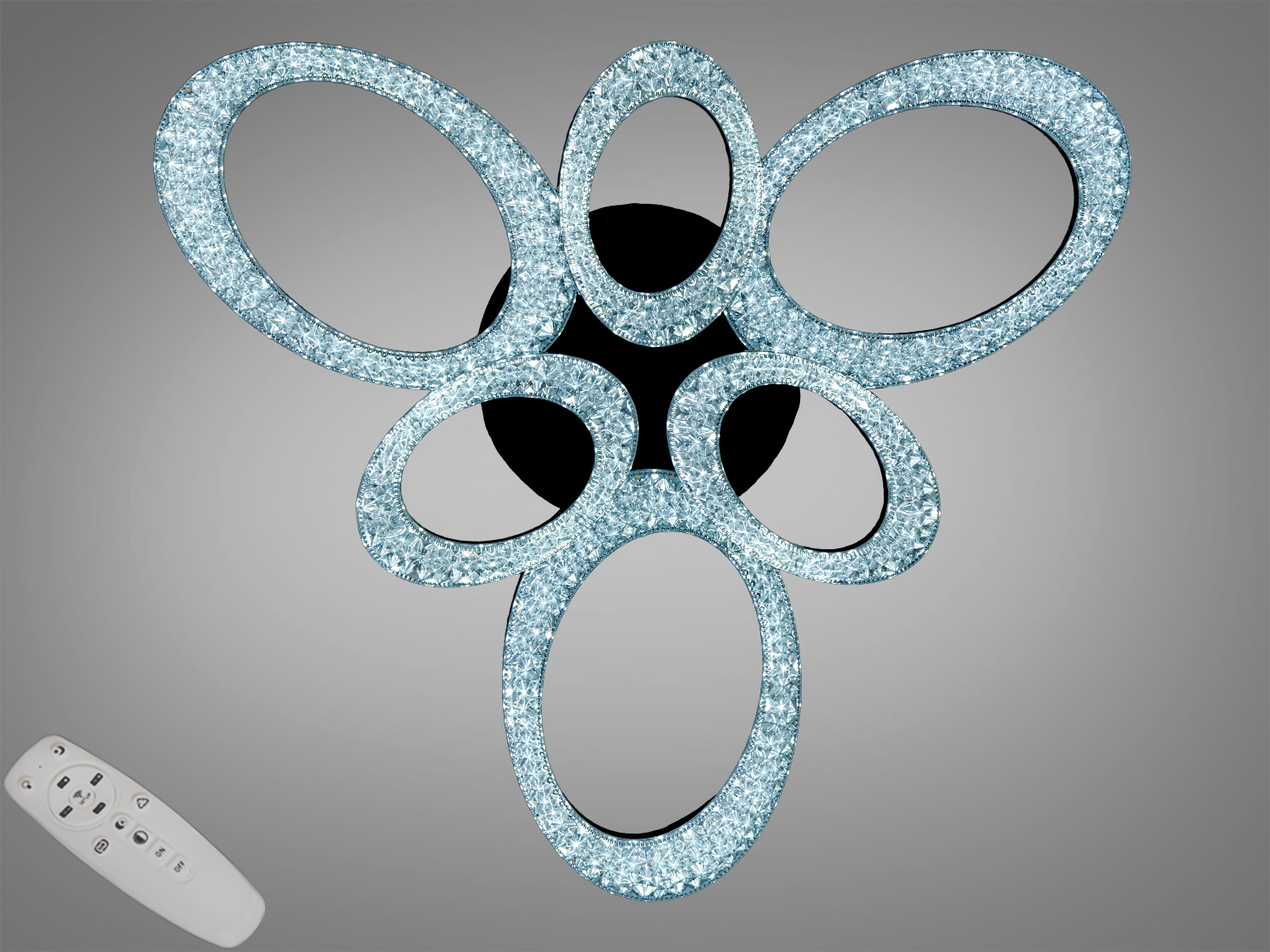 Люстра з п′ятьма овальними кільцями, оздоблена кристалами, з пультом дистанційного керування для зручного налаштування освітлення.