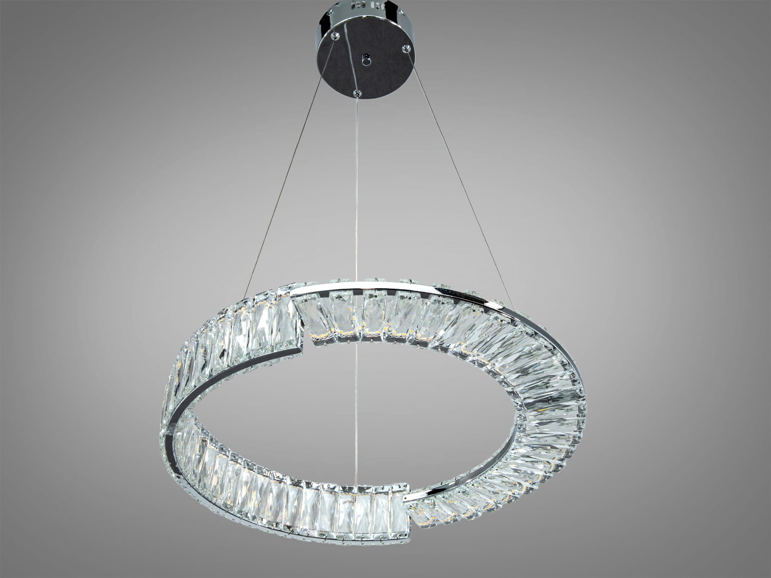 Підвісний світильник з кришталевим кільцем, підвішений на металевих тросах. Ідеальний для високих стель.