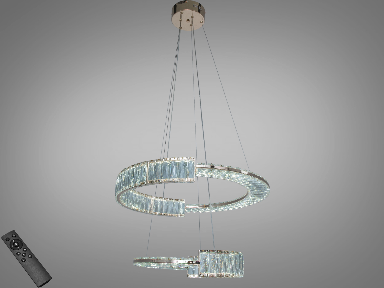 Підвісна LED-люстра 103 Вт із двома кришталевими кільцями у золоті та пультом димування. Орієнтована на кімнати до 18 м², регульовані підвіси, інтегровані LED-модулі.