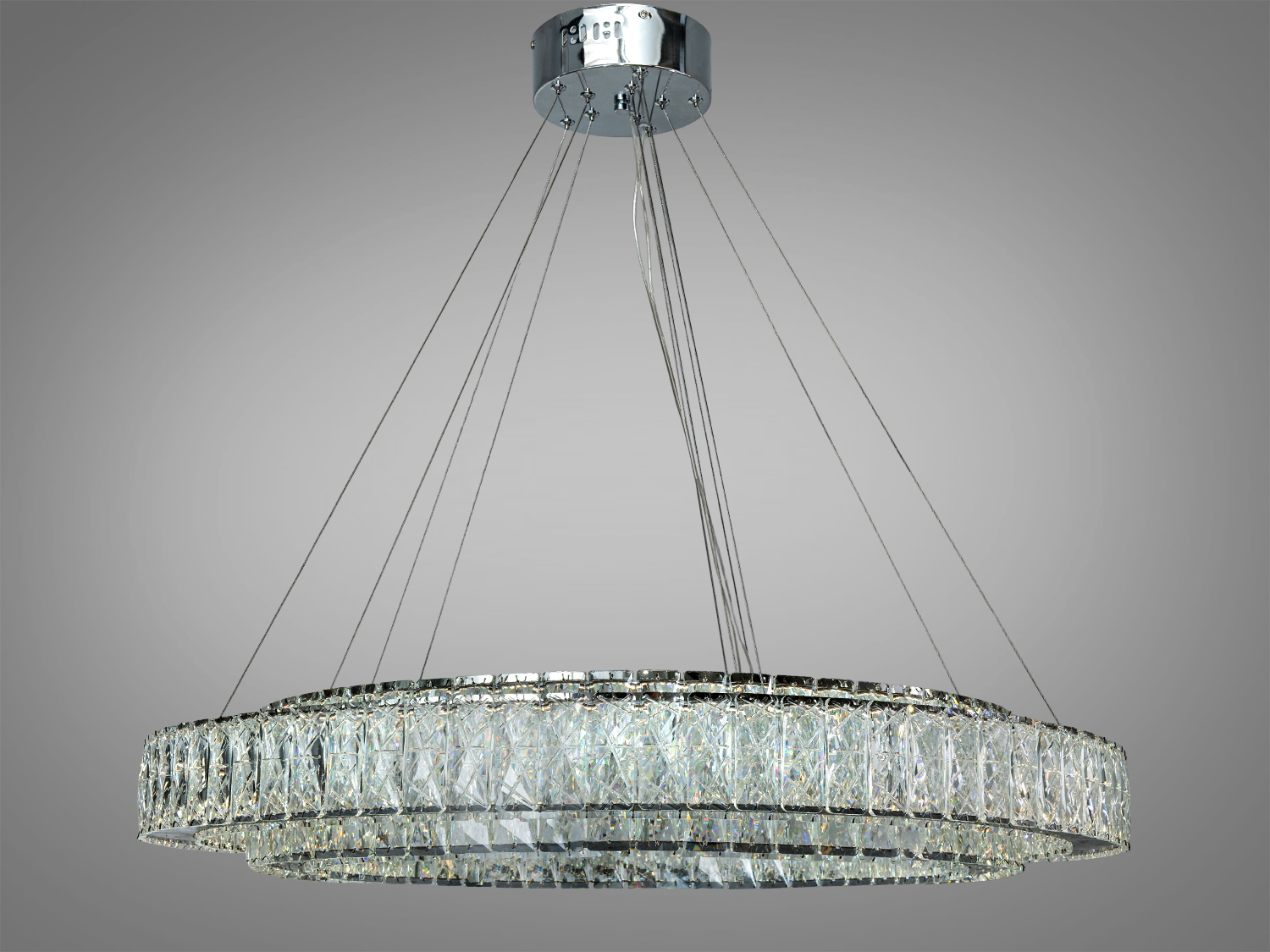 Підвісна люстра з двома кільцями кришталевих елементів, кріпиться на металевій основі. Ідеальна для вітальні або їдальні.