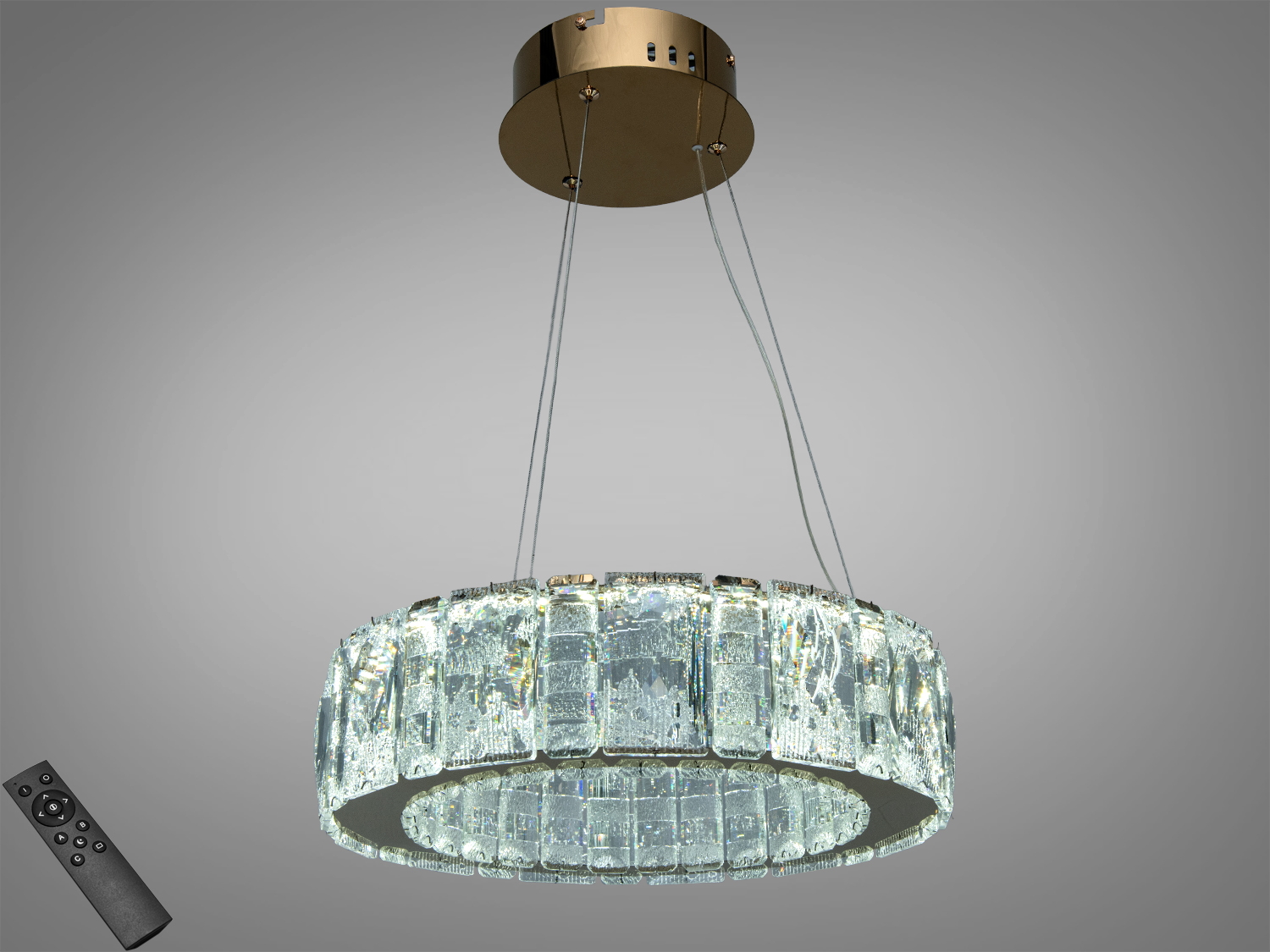 Підвісна люстра з кришталевими елементами, круглої форми, оснащена пультом дистанційного керування для регулювання освітлення.