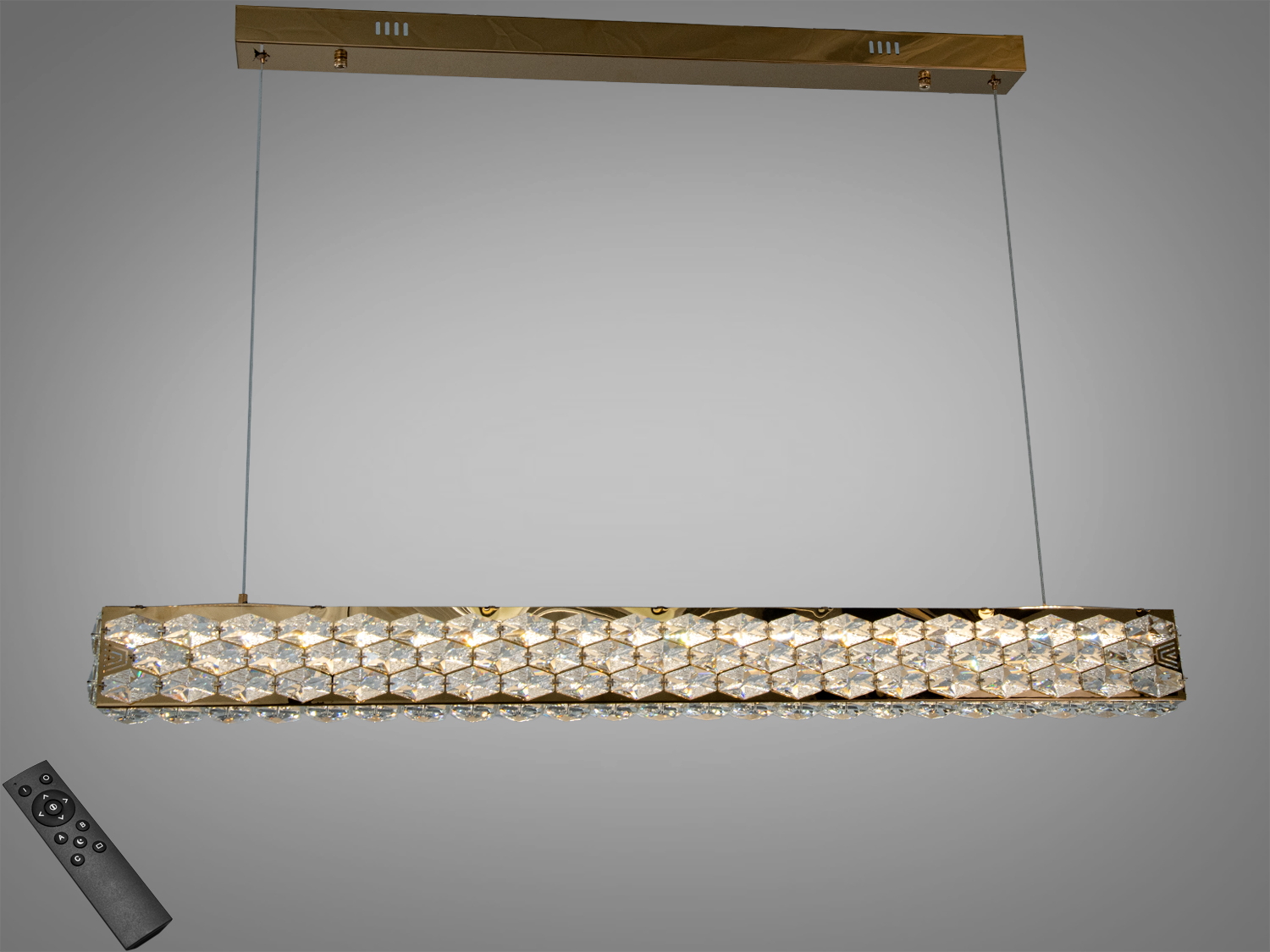 Підвісна кришталева LED-люстра Diasha 43Вт у золоті з пультом. Лінійна форма, кристали та мʼяке освітлення зон до 8 м². Є варіант у хромі.