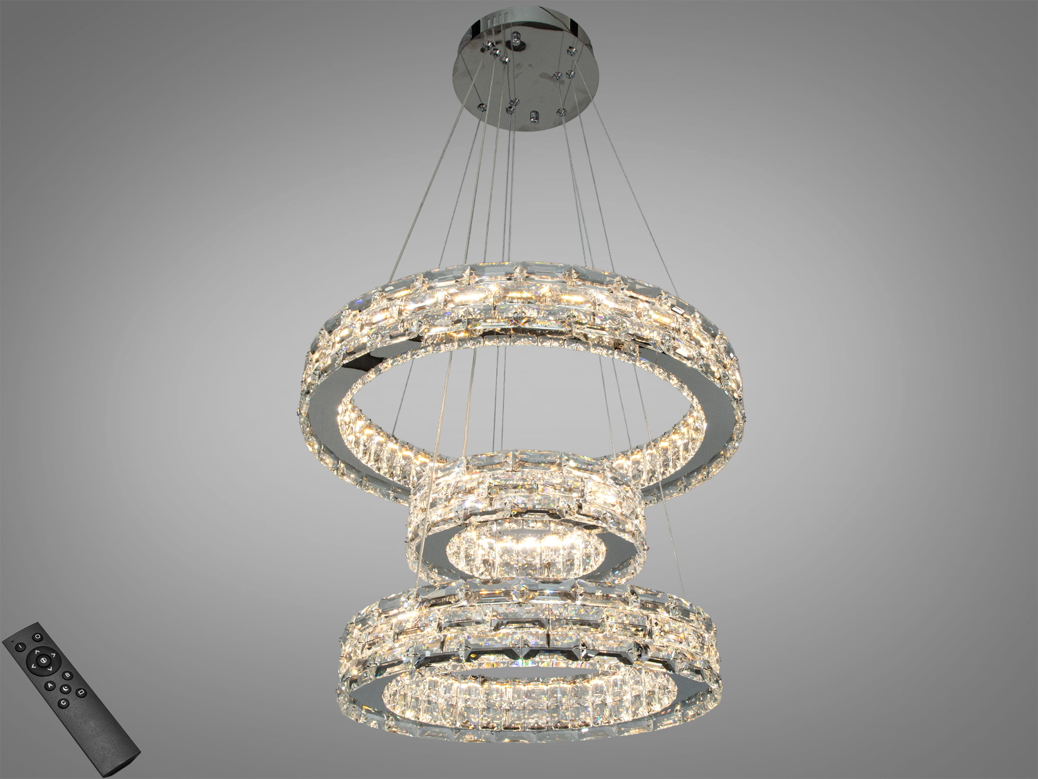 Підвісна кришталева LED люстра 70 Вт у хромі з трьома кільцями та пультом. Освітлення до 12 м², регульована висота, сучасний каскад.
