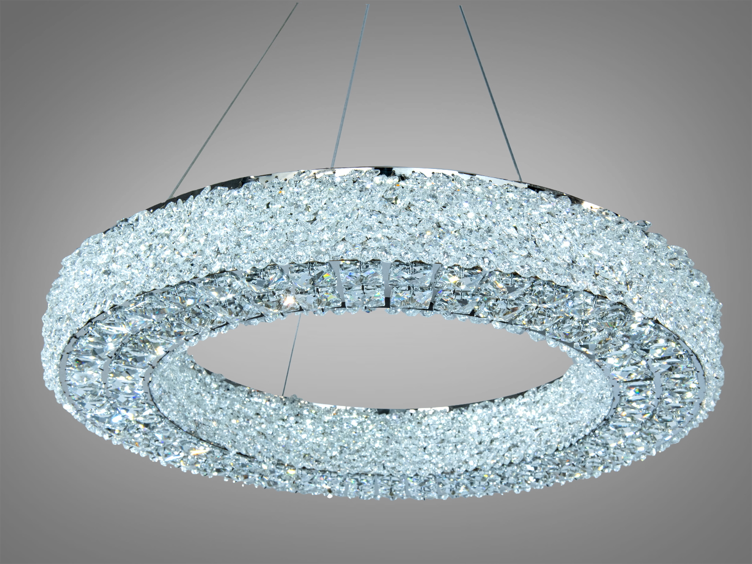 Кругла люстра з прозорого кришталю, підвісна конструкція, ідеальна для вітальні, створює ефектний світловий акцент.