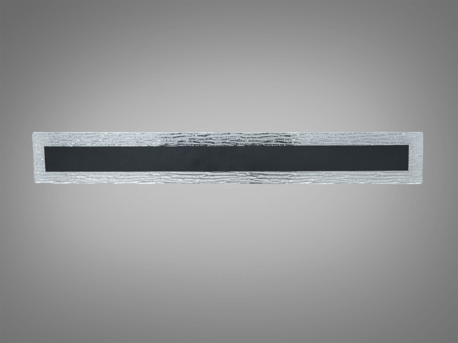 Довгий світильник з рифленого скла з чорним матовим центром. Підходить для коридорів або просторих кімнат.