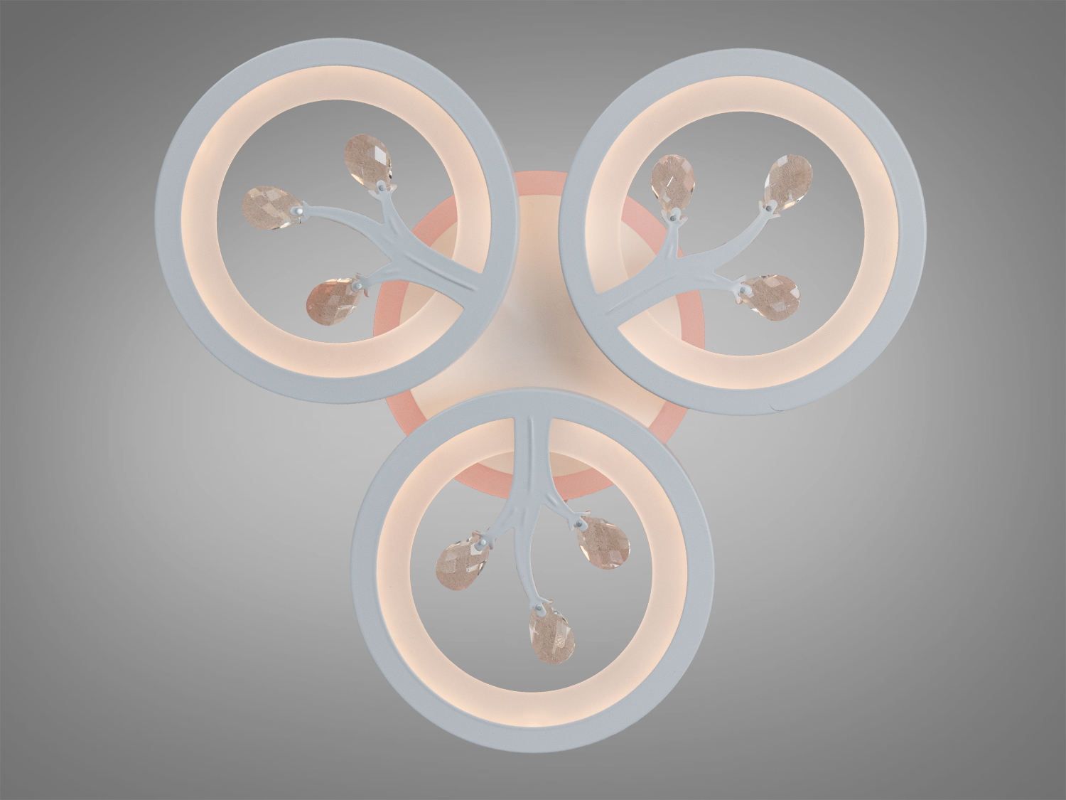 Стельовий світильник у формі трьох кілець з теплим світлом, прикрашений кришталевими елементами. Ідеальний для затишної атмосфери.