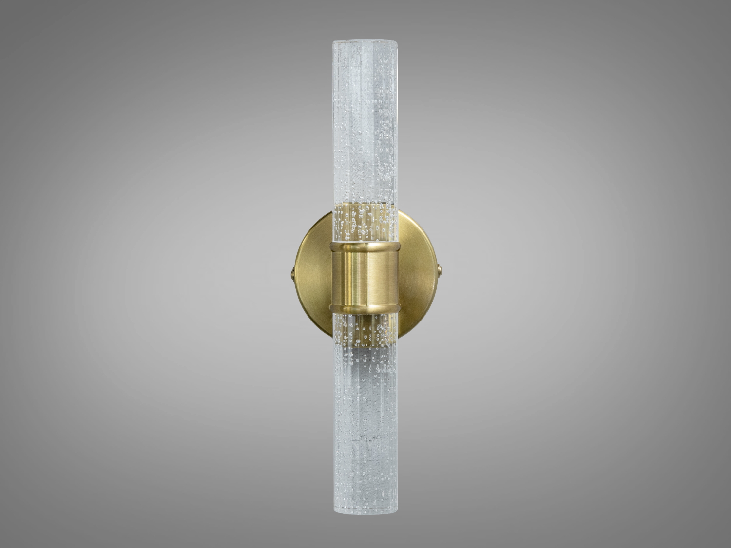 Вертикальний настінний світильник з прозорим склом та латунною основою, що підходить для ванної кімнати. Елегантний та функціональний.