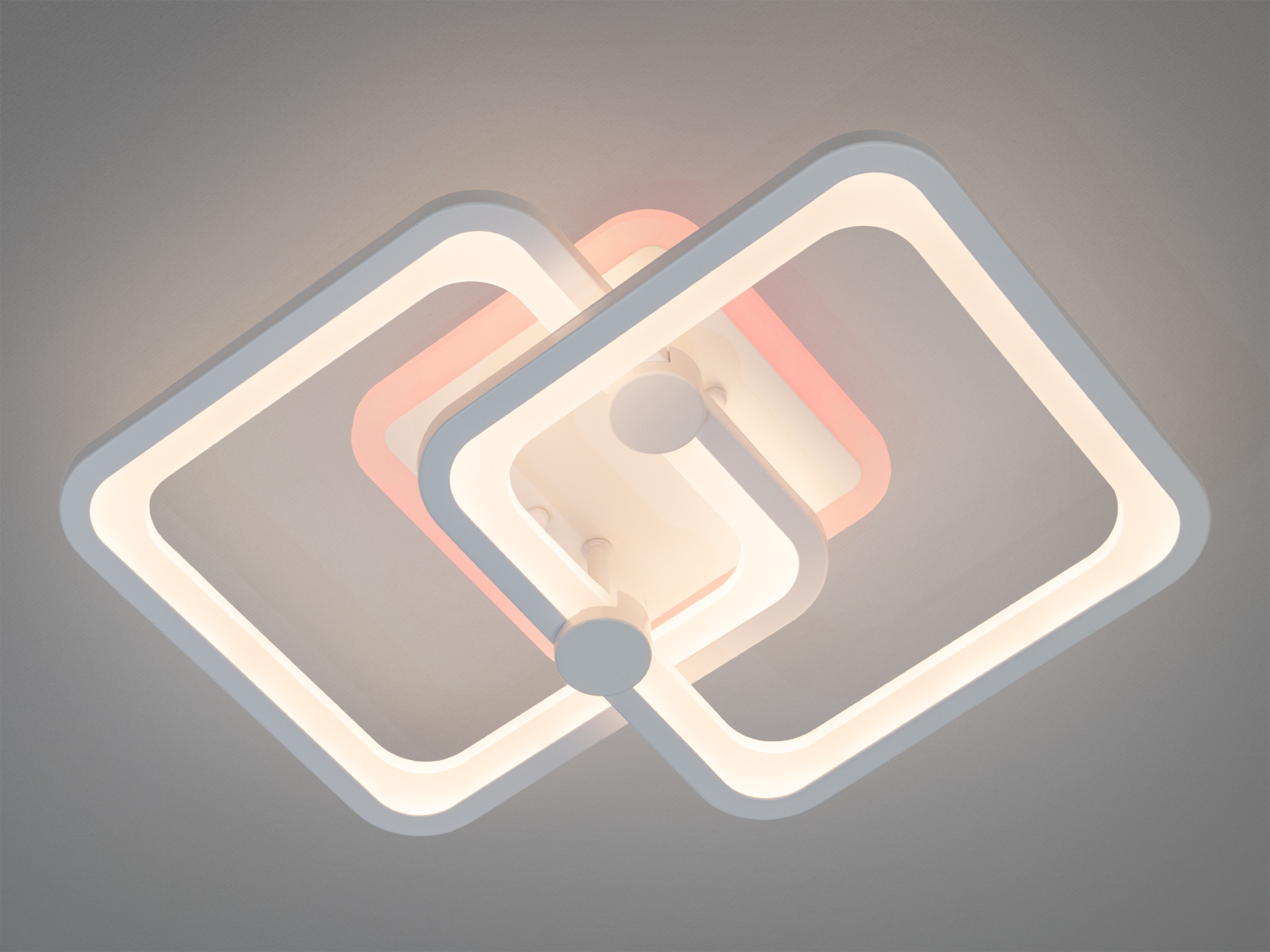 Світильник з квадратними рамками, що випромінюють тепле біле та червоне світло. Ідеально підходить для створення затишної атмосфери у вітальні.