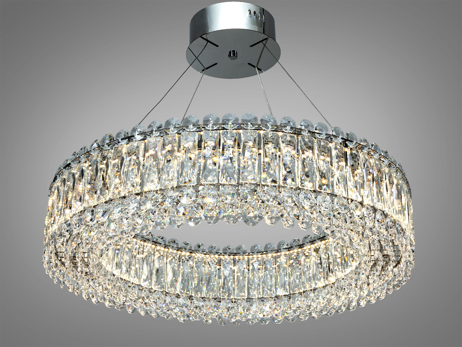 Кругла кришталева люстра з підвісами, що створюють ефект блиску. Підходить для вітальні або їдальні.
