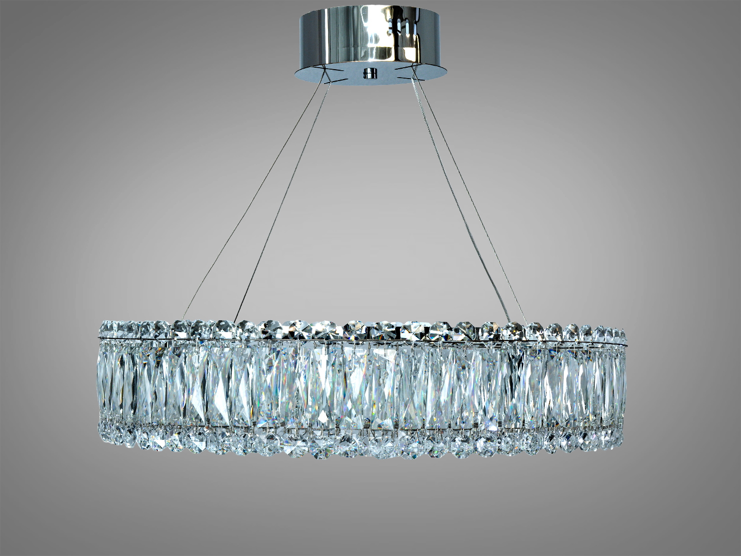 Кругла люстра з прозорими кришталевими елементами, підвішена на тросах. Підходить для просторих приміщень.