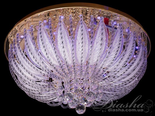 Новий час - нові віяння. І ось вже нікого не здивуєш оригінальними &laquo;люстрами-торт&raquo;. Ці люстри відмінно впишуться практично в будь-який інтер'єр, а 3-х кольорове світлодіодне підсвічування стане багатим окрасою всієї кімнати. Світлодіодне підсвічування складається з червоного, синього та рожевого кольору. А при включенні плавного переходу від кольору до кольору, Ви будете зачаровано спостерігати нові відтінки - блідо бузковий, помаранчевий, блакитний. Чудовий релакс після трудових буднів. Строгість та витонченість форм, безліч кришталевих та скляних підвісок, насиченість та деталізація - ця люстра стане центром вашого інтер'єру.
Наявність різних розмірів люстр в одній серії дозволяє вирішити освітлення всього будинку в одному стилі.