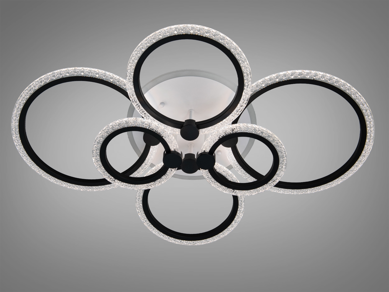 Світильник з кільцями, що світяться, для стельового монтажу. Мінімалістичний дизайн з акцентом на простоту та ефективність.