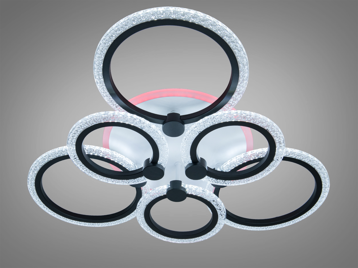 Стельова люстра з п′ятьма кільцями, має червоне підсвічування, ідеальна для сучасних інтер′єрів.