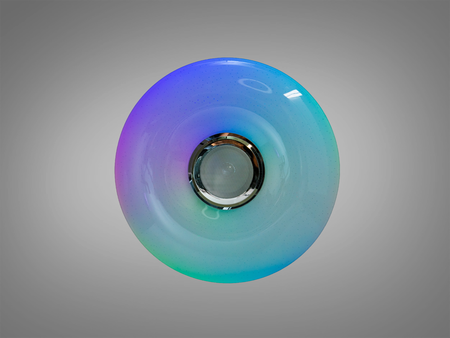 Кругла лампа з кольоровим підсвічуванням, що створює атмосферу, підходить для декоративного освітлення.