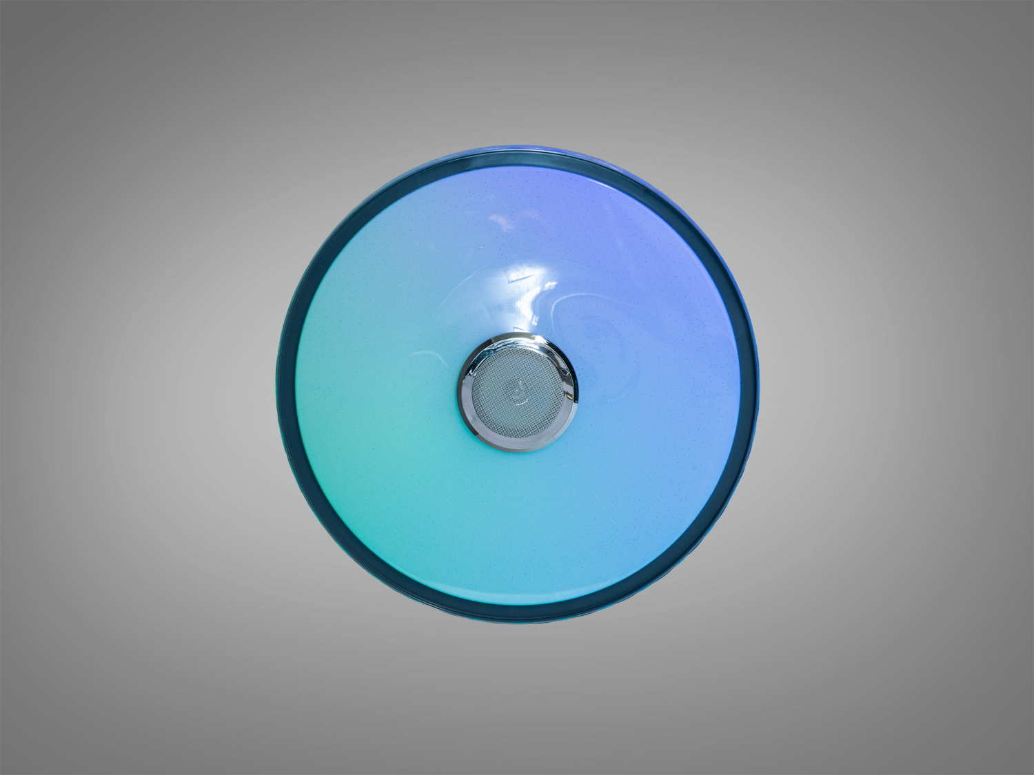 Вид знизу на круглу стельову лампу, що випромінює м′яке синє світло. Підходить для створення затишної атмосфери.