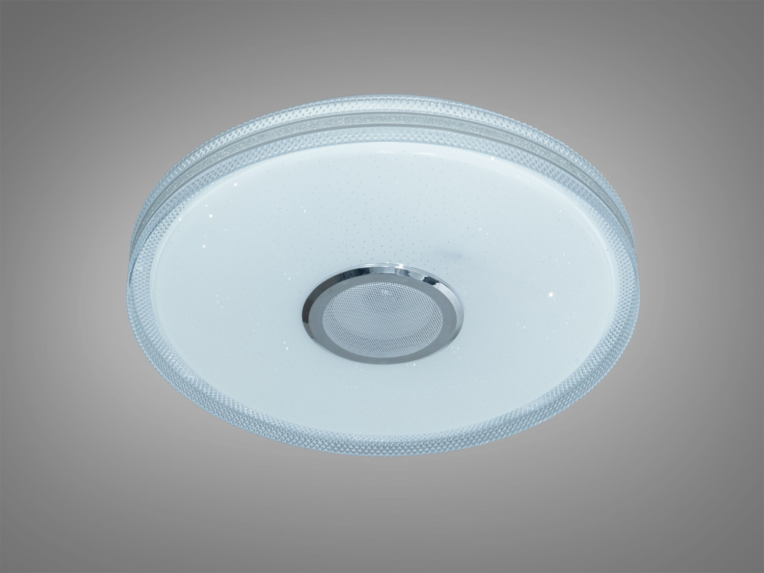 Білий круглий світильник зі світлодіодами, має сріблястий обідок. Ідеальний для мінімалістичного дизайну, стельовий монтаж.