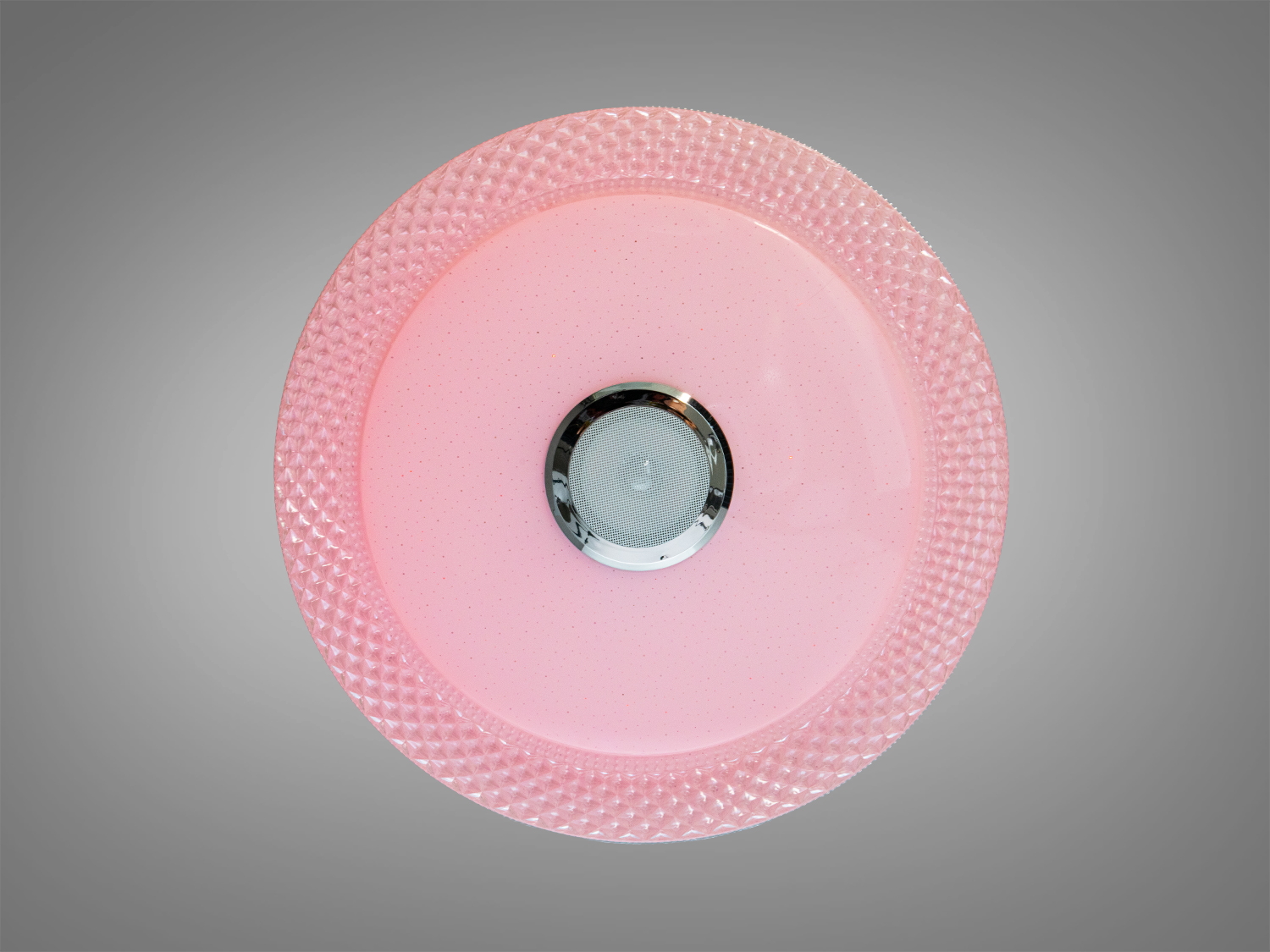 Стельова лампа з рожевим світлом, кругла форма, гладка поверхня, ідеальна для спальні або дитячої кімнати.