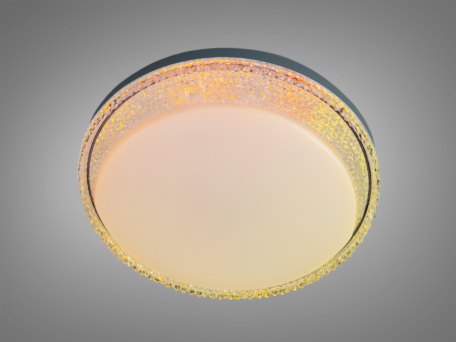 Кругла стельова лампа з теплим жовтим світлом, кристалічний обідок, підходить для вітальні.