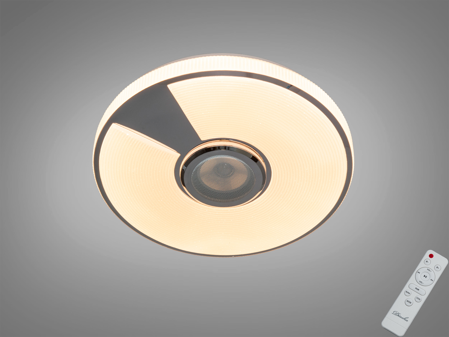 Кругла стельова лампа з теплим світлом, оснащена пультом керування. Ідеально підходить для сучасного інтер′єру.