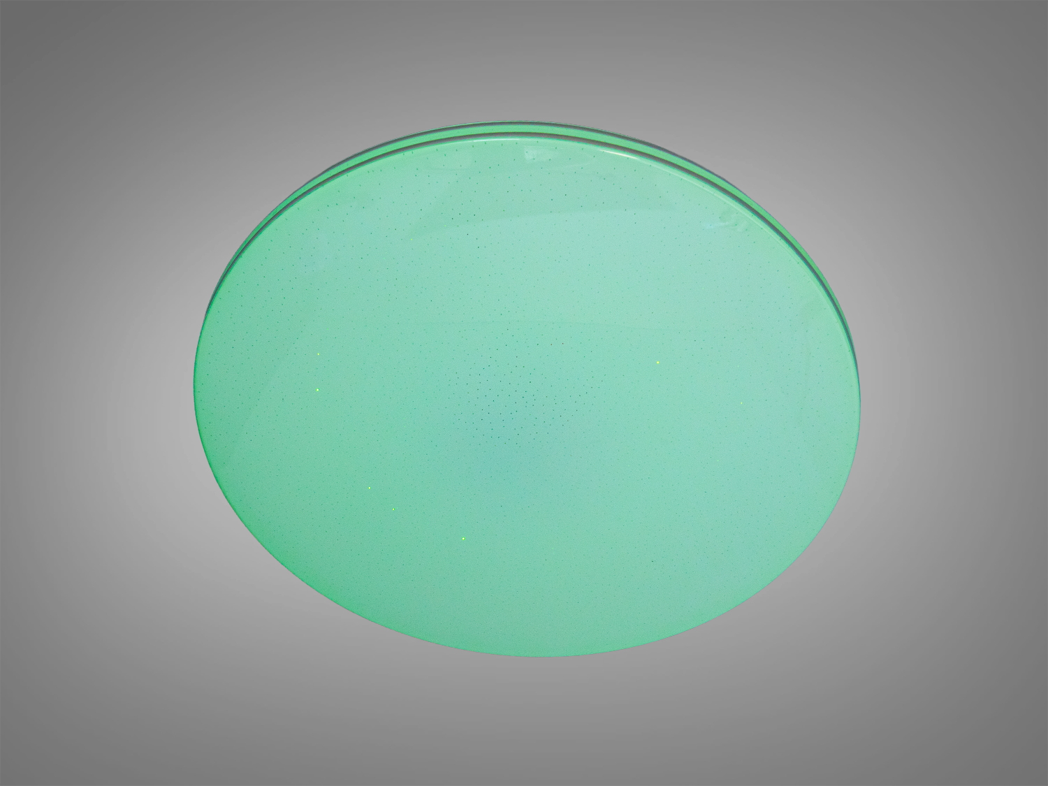 Стельова лампа круглої форми з м′яким зеленим світлом. Підходить для створення заспокійливої атмосфери.